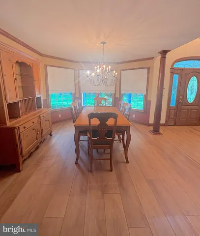 a view of a room with a large window