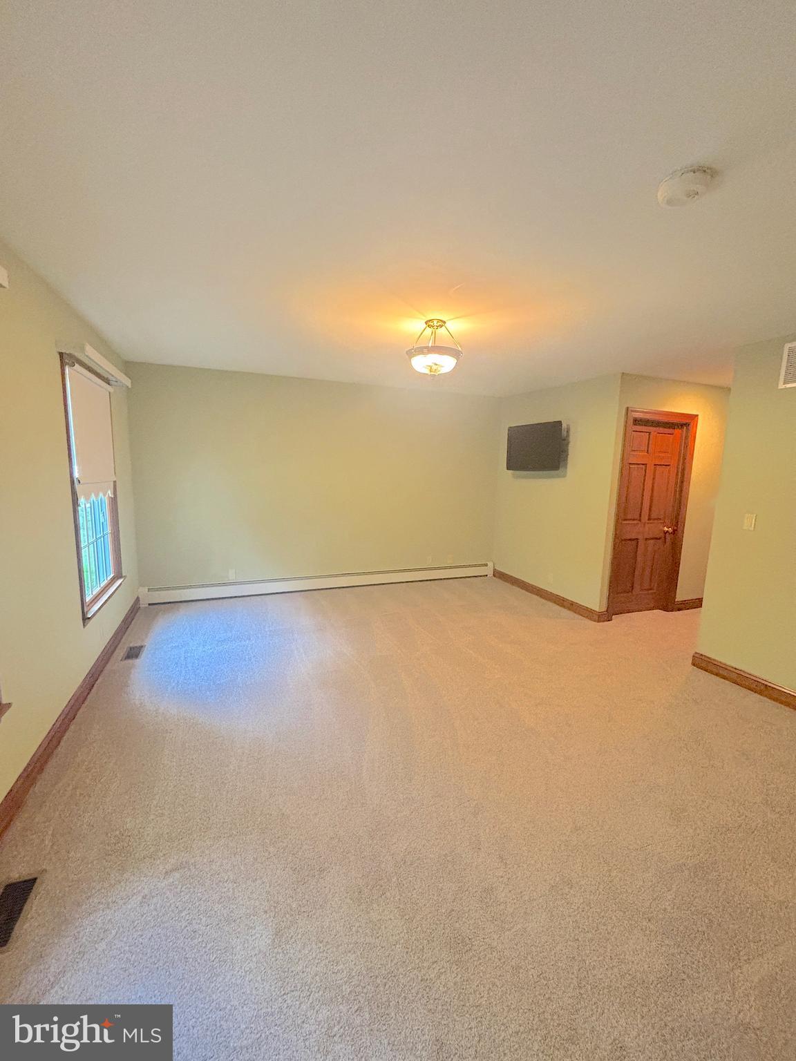 3138-3142 Moss Mill Road Hammonton, NJ 08037 - Photo 31 of 73 a view of an empty room with a window