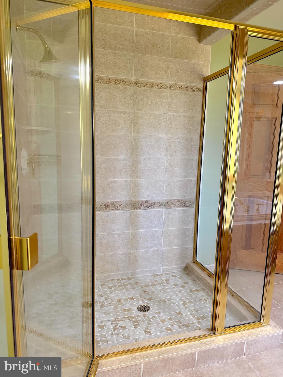 3138-3142 Moss Mill Road Hammonton, NJ 08037 - Photo 35 of 73 a bathroom with a glass shower door