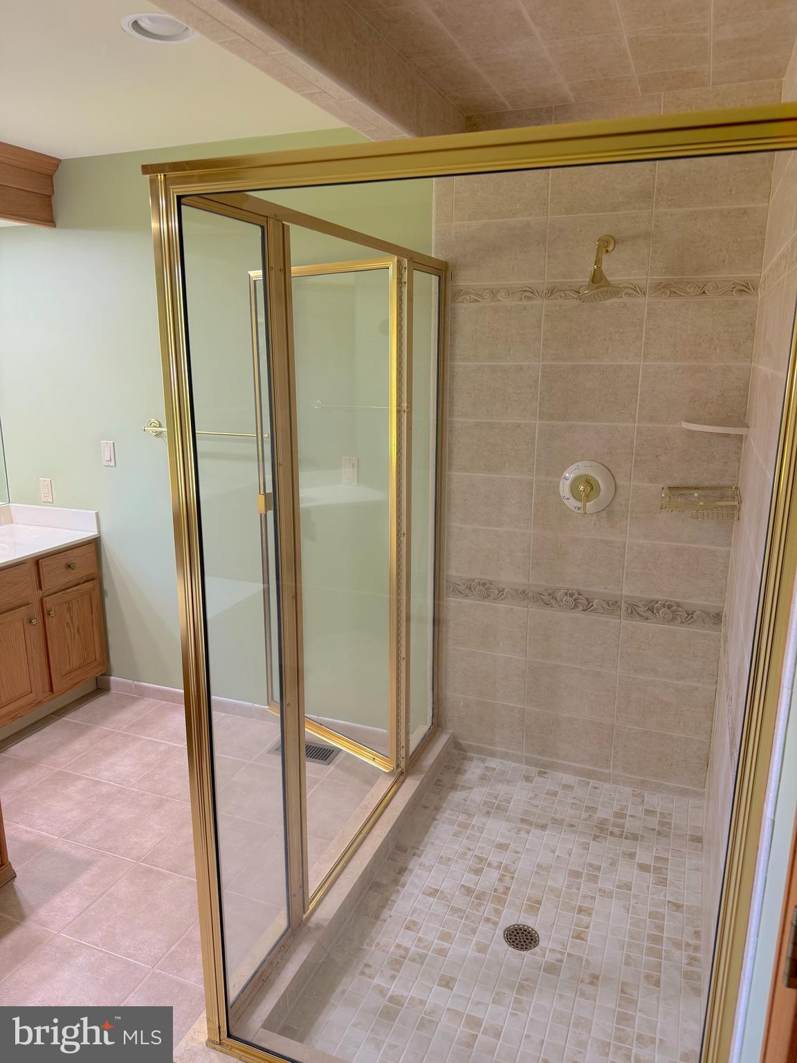 3138-3142 Moss Mill Road Hammonton, NJ 08037 - Photo 37 of 73 a bathroom with a glass shower door