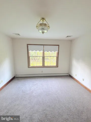 a white refrigerator freezer sitting inside of a kitchen