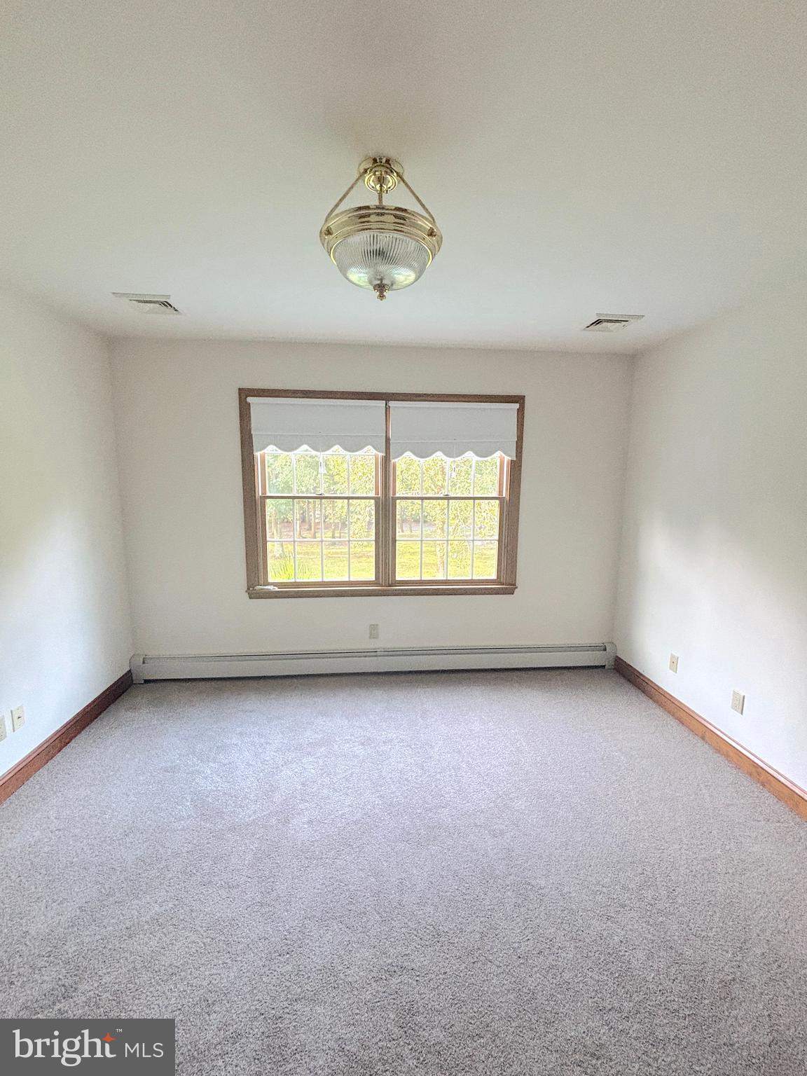 3138-3142 Moss Mill Road Hammonton, NJ 08037 - Photo 44 of 73 an empty room with a window