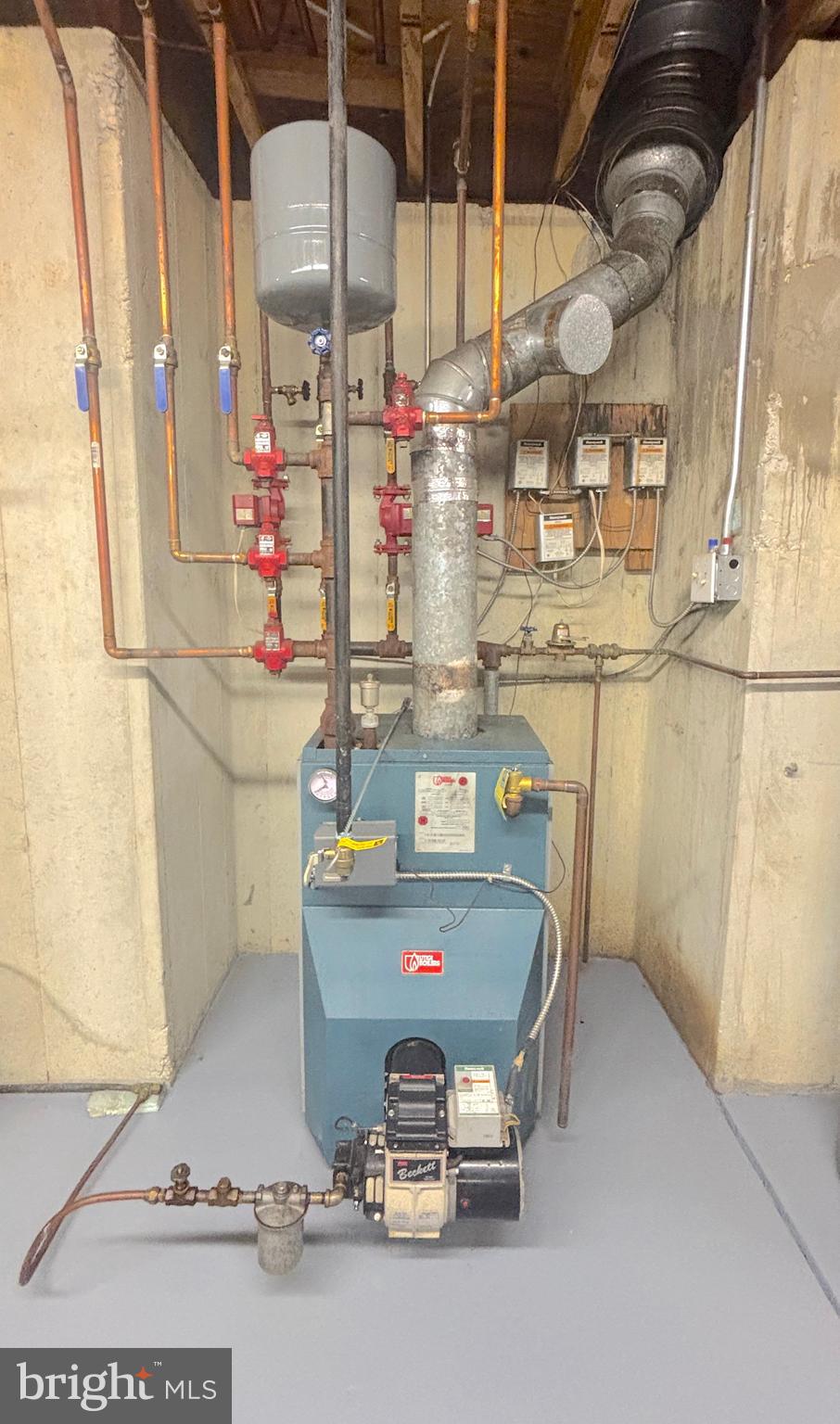 3138-3142 Moss Mill Road Hammonton, NJ 08037 - Photo 57 of 73 a room with water heater and cabinets