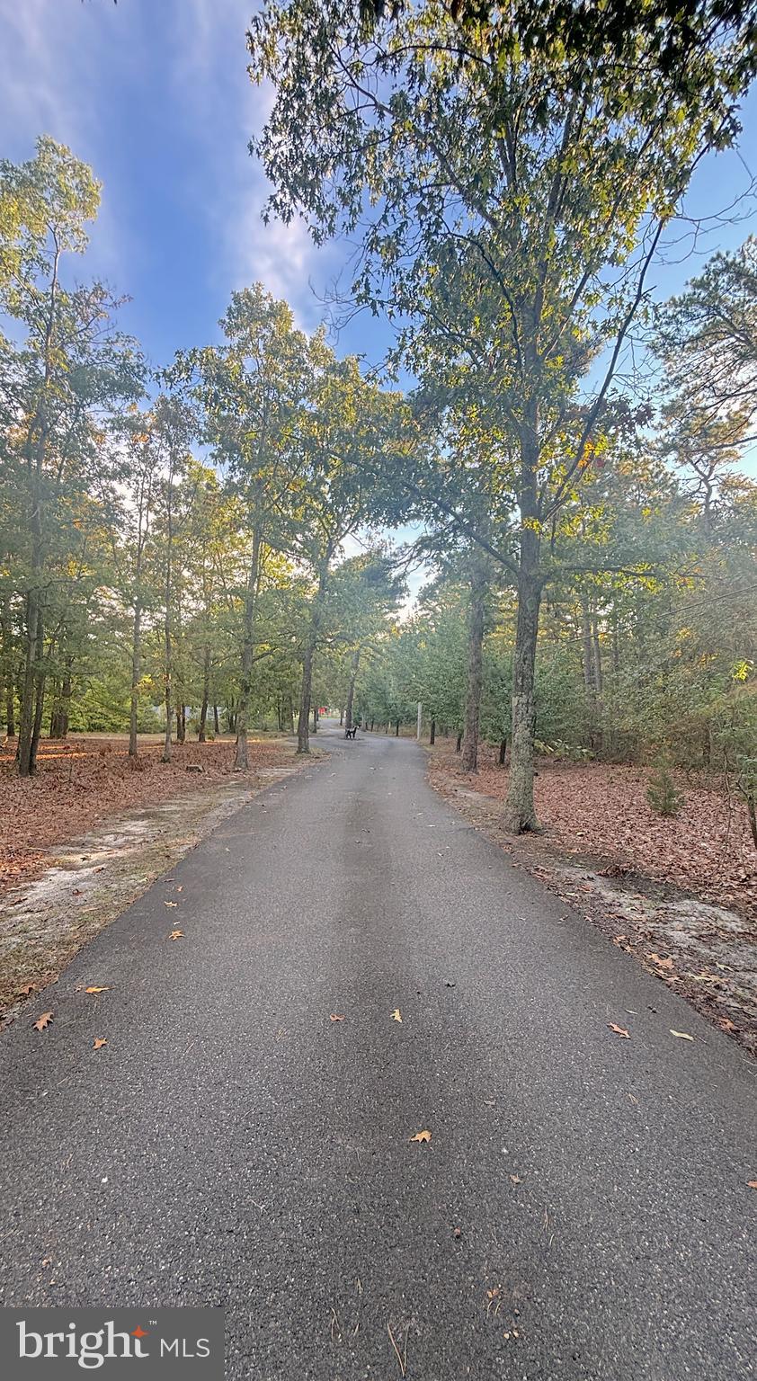 3138-3142 Moss Mill Road Hammonton, NJ 08037 - Photo 10 of 73 a view of a road with a house in the background