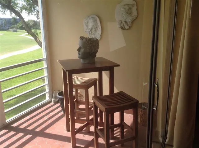 a view of entryway with wooden door