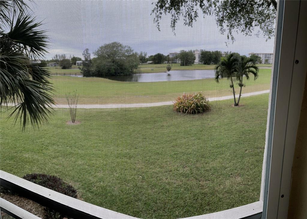 2681 South Course Drive, Unit 212 Pompano Beach, FL 33069 - Photo 7 of 16 a view of a outdoor space