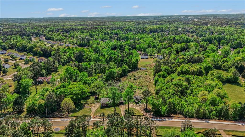 1315 Fairview Road Ellenwood, GA 30294 - Photo 33 of 34 an aerial view of a houses with a yard