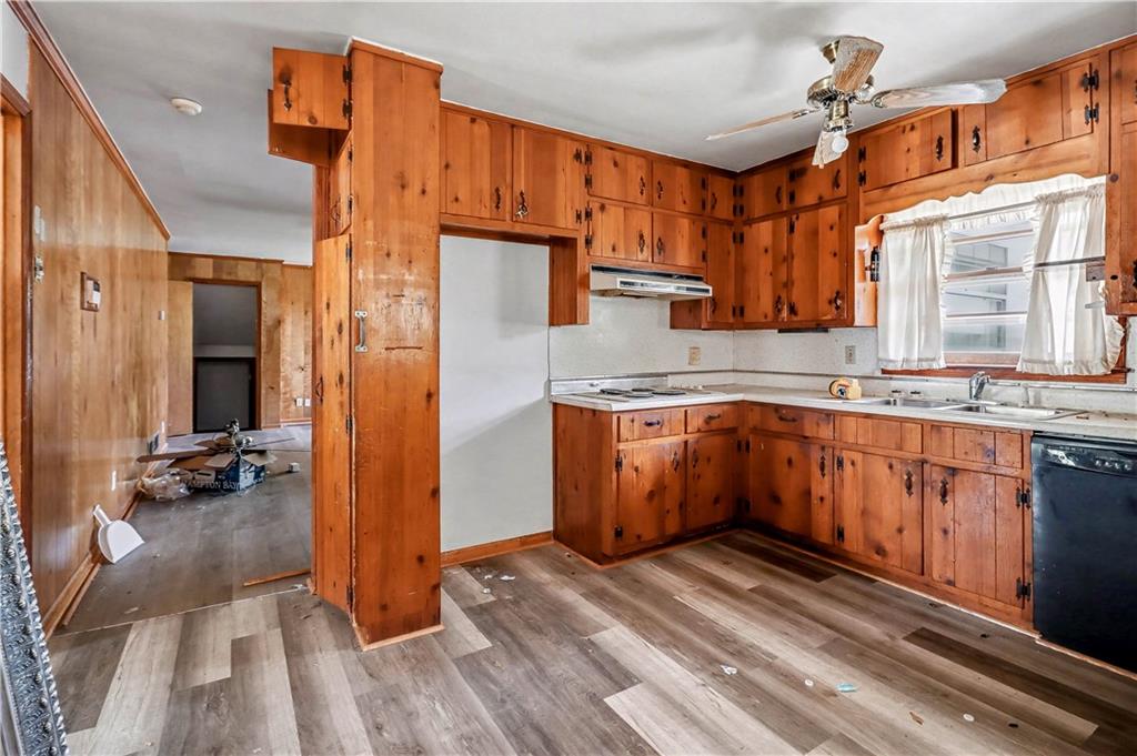 1315 Fairview Road Ellenwood, GA 30294 - Photo 7 of 34 a kitchen with stainless steel appliances granite countertop a stove a sink and a refrigerator