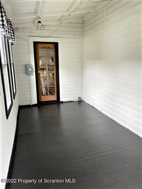 991 Main Street Rome, PA 18837 - Photo 15 of 53 an empty room with wooden floor and windows