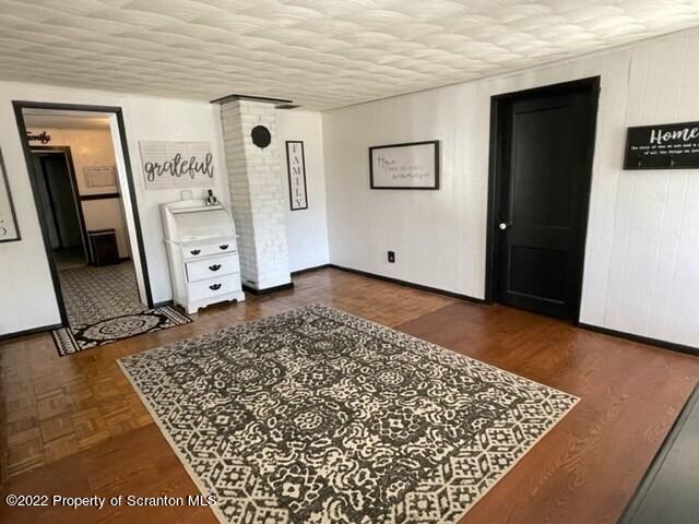 991 Main Street Rome, PA 18837 - Photo 20 of 53 a view of livingroom with furniture and hardwood floor