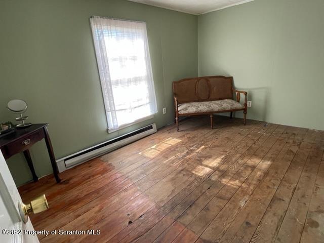 991 Main Street Rome, PA 18837 - Photo 42 of 53 a living room with furniture and a window