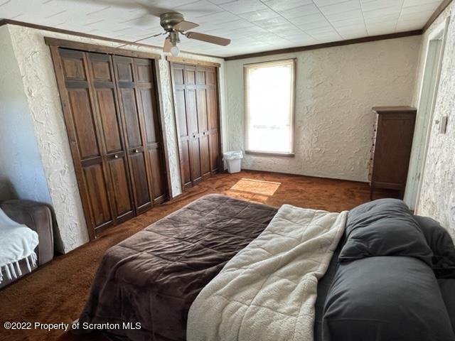 991 Main Street Rome, PA 18837 - Photo 46 of 53 a bedroom with a bed and a window