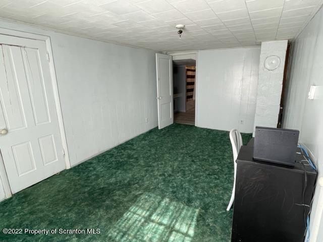 991 Main Street Rome, PA 18837 - Photo 48 of 53 a view of an empty room with a fireplace and a window