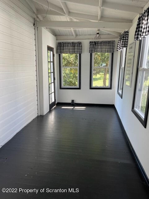 991 Main Street Rome, PA 18837 - Photo 5 of 53 wooden floor in an empty room with a window