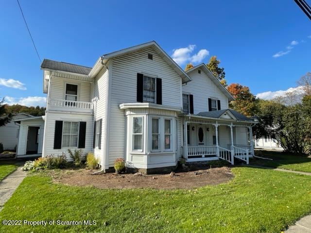 991 Main Street Rome, PA 18837 - Photo 52 of 53 a front view of a house with a yard