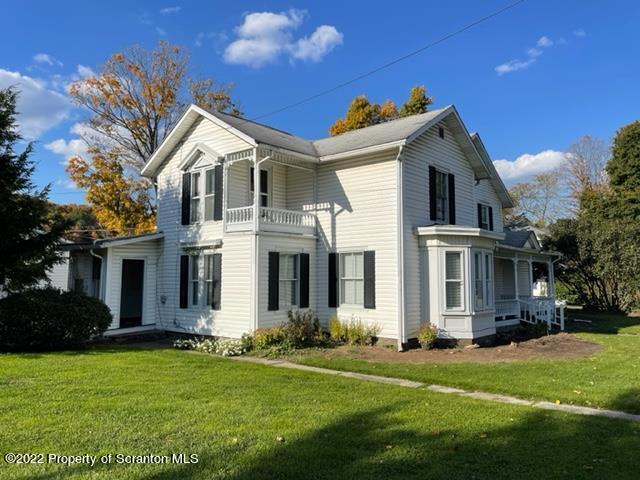 991 Main Street Rome, PA 18837 - Photo 6 of 53 a front view of house with yard and green space