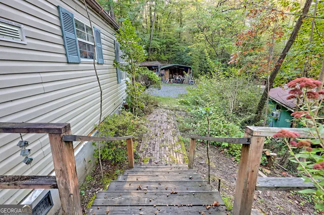 a view of deck with furniture and hardwood floor