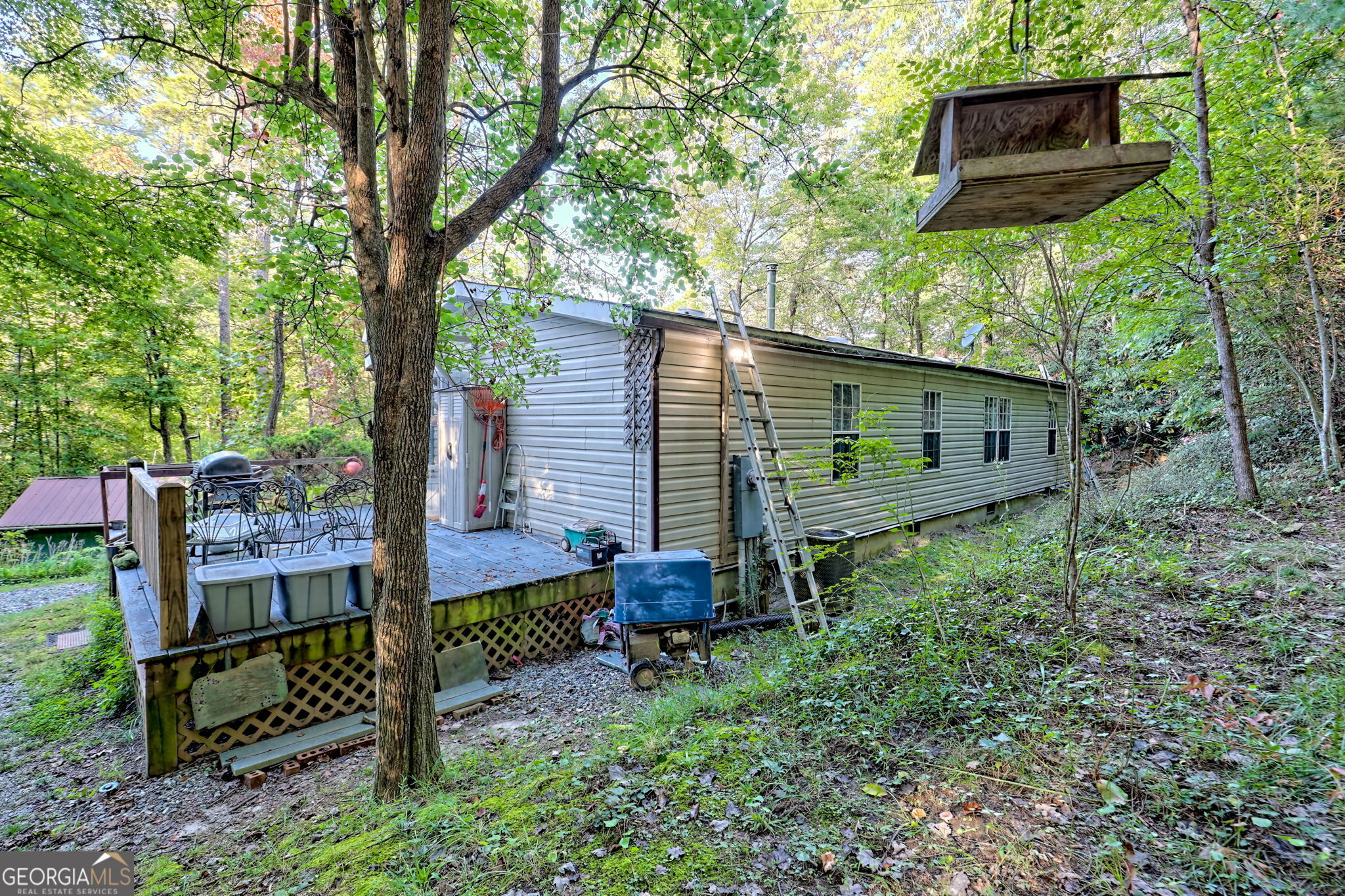 11 Copperhead Lane Clayton, GA 30525 - Photo 18 of 25 a front view of a house with a garden