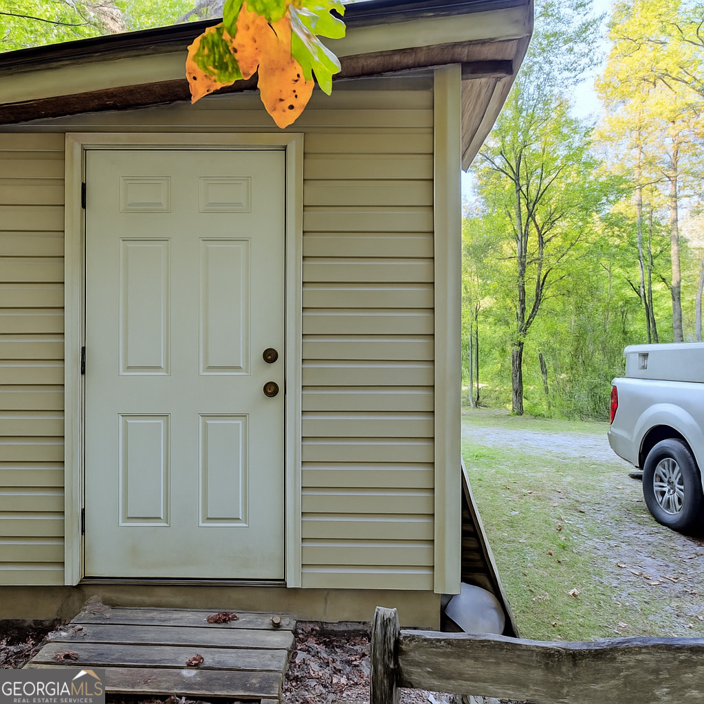 11 Copperhead Lane Clayton, GA 30525 - Photo 19 of 25 a view of a house with a door