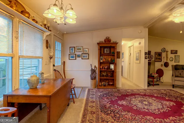 a view of a livingroom with furniture