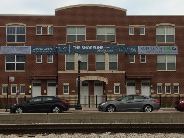 2314 East 71st Street, Unit B Chicago, IL 60649 - Photo 16 of 19 a car parked in front of a brick building