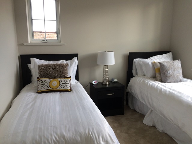 2314 East 71st Street, Unit B Chicago, IL 60649 - Photo 10 of 19 a bedroom with a bed and window