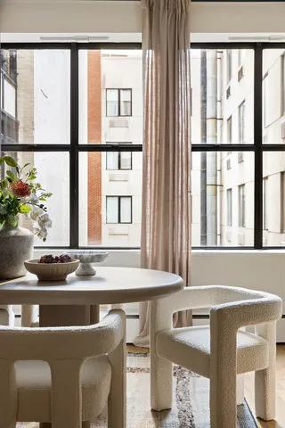 a room that has a table and chair in it