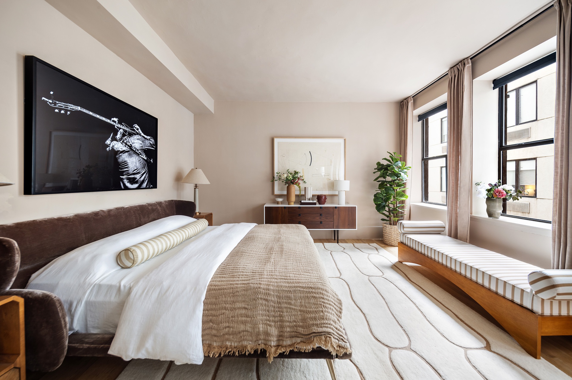 260 West Broadway, Unit 4C Manhattan, NY 10013 - Photo 17 of 28 a bedroom with a bed and a large mirror