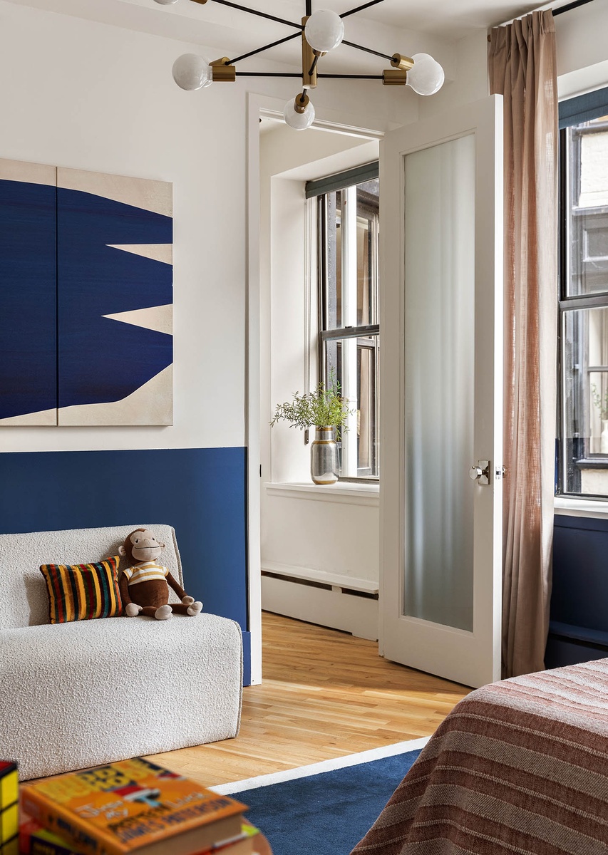 260 West Broadway, Unit 4C Manhattan, NY 10013 - Photo 20 of 28 a bedroom with a bed and window