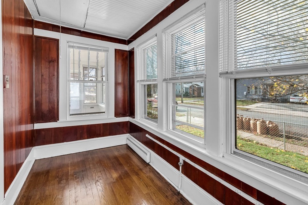 55 Redlands Street Springfield, MA 01104 - Photo 21 of 42 a view of a room with wooden floor and windows
