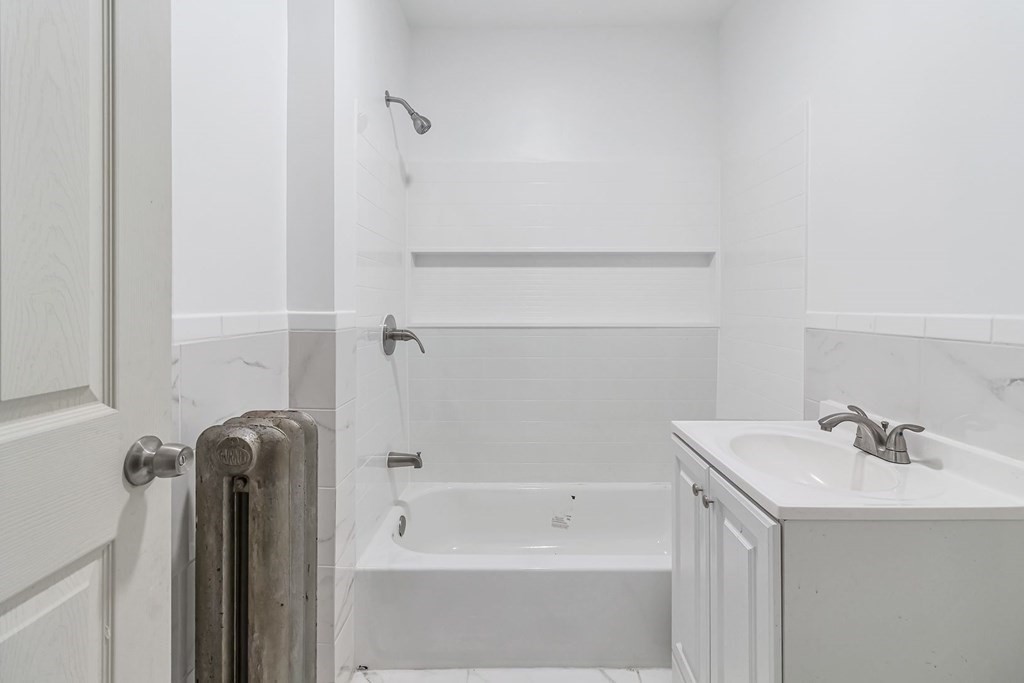 55 Redlands Street Springfield, MA 01104 - Photo 26 of 42 a bathroom with a shower and a sink