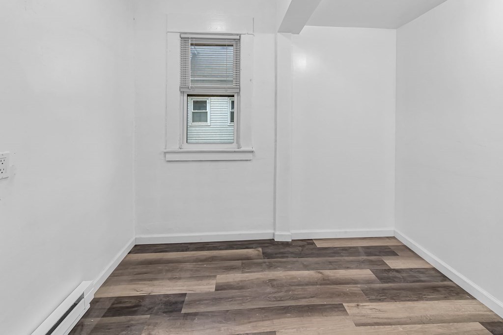 55 Redlands Street Springfield, MA 01104 - Photo 27 of 42 a view of empty room with wooden floor
