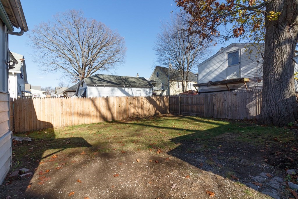 55 Redlands Street Springfield, MA 01104 - Photo 39 of 42 a view of backyard with tree