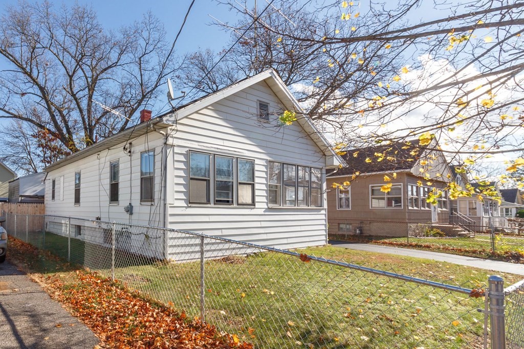 55 Redlands Street Springfield, MA 01104 - Photo 42 of 42 a front view of a house with a yard