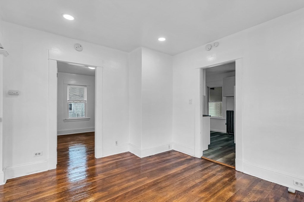 55 Redlands Street Springfield, MA 01104 - Photo 10 of 42 a view of empty room with wooden floor