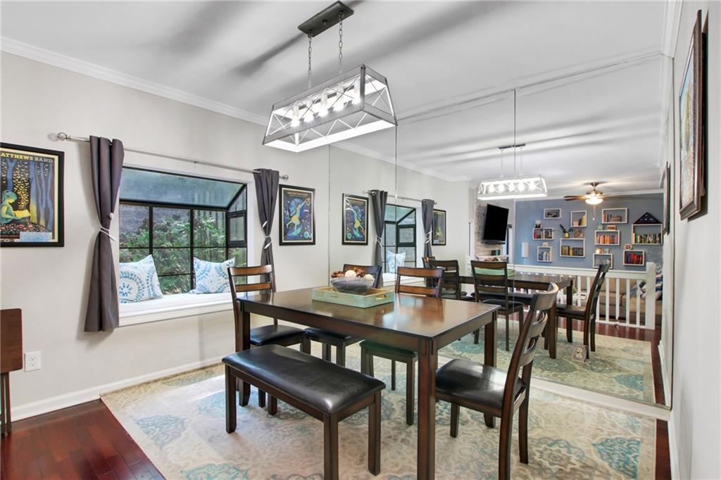 1929 Variations Drive Northeast Atlanta, GA 30329 - Photo 11 of 33 a view of a dining room with furniture window and wooden floor