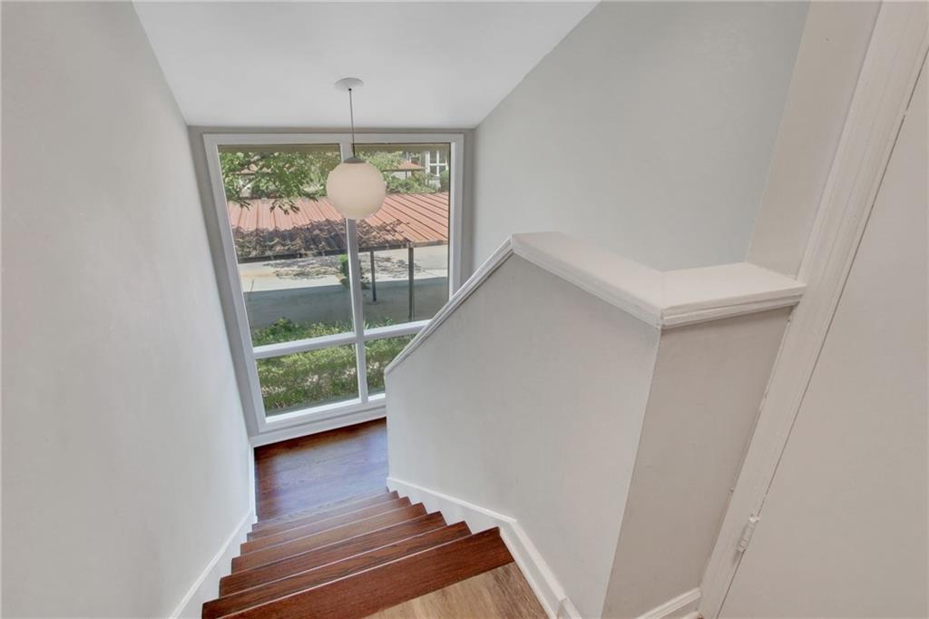 1929 Variations Drive Northeast Atlanta, GA 30329 - Photo 19 of 33 a view of room with window and wooden floor