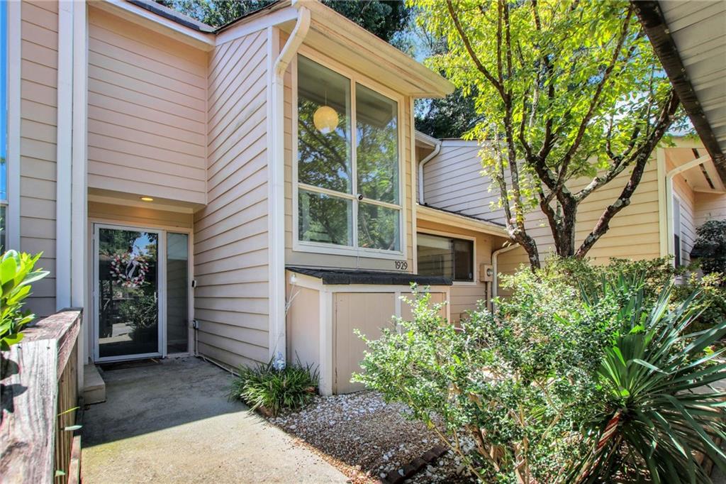 1929 Variations Drive Northeast Atlanta, GA 30329 - Photo 2 of 33 a view of a house with a yard