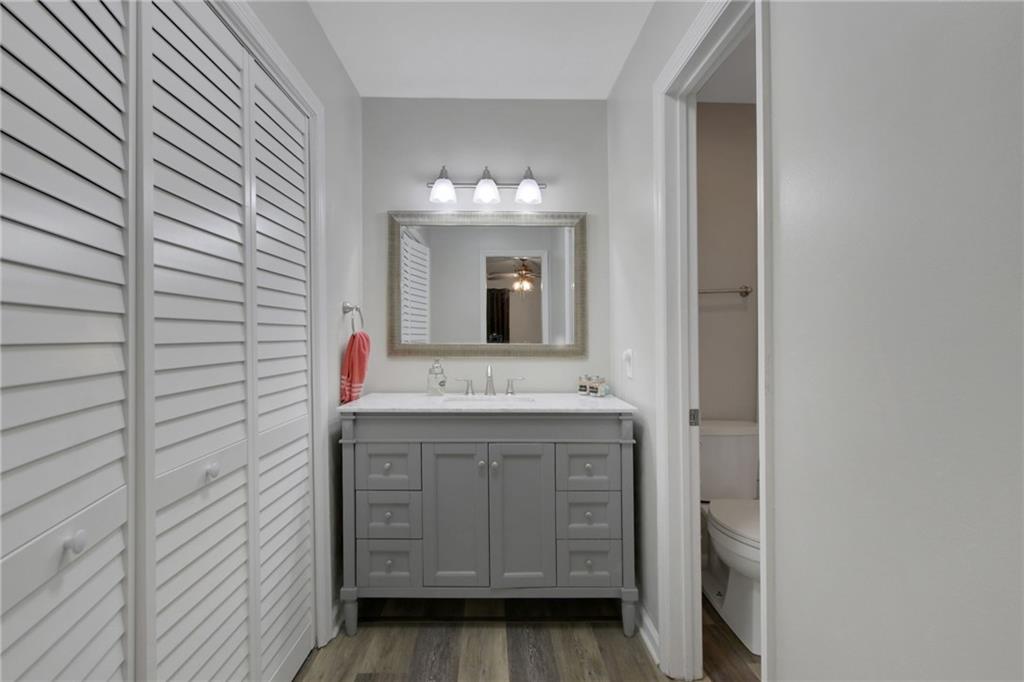 1929 Variations Drive Northeast Atlanta, GA 30329 - Photo 24 of 33 a bathroom with a sink and a mirror