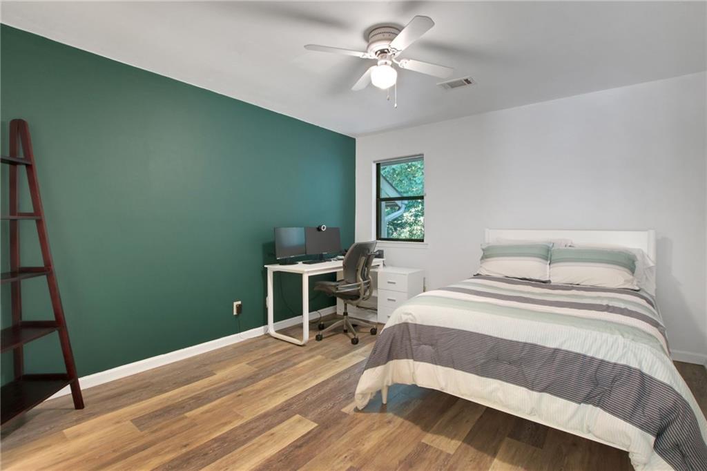 1929 Variations Drive Northeast Atlanta, GA 30329 - Photo 27 of 33 a bedroom with a bed and a window