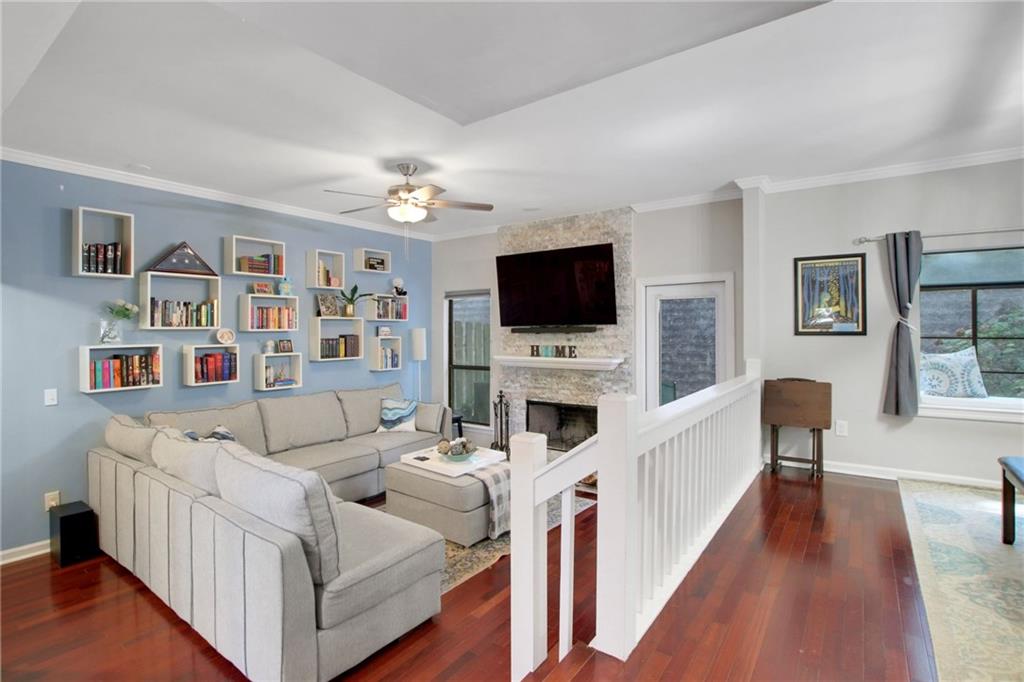 1929 Variations Drive Northeast Atlanta, GA 30329 - Photo 5 of 33 a living room with furniture and a flat screen tv