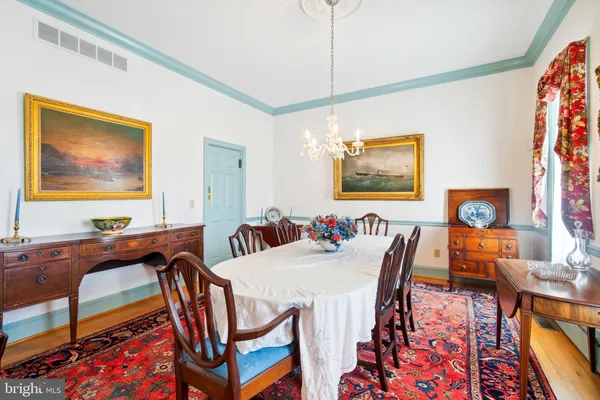 a view of a dining room with furniture