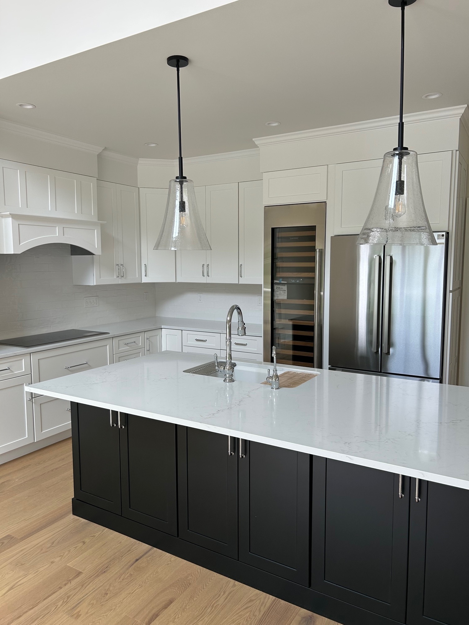 22 Village Circle, Unit 22 Guilford, CT 06437 - Photo 3 of 8 a kitchen with stainless steel appliances granite countertop a sink stove and refrigerator