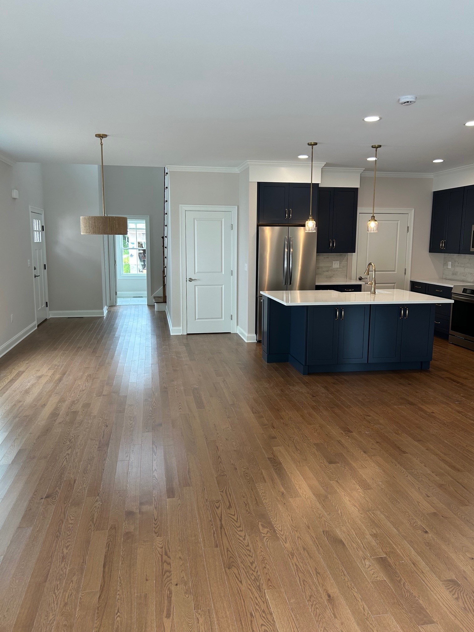 22 Village Circle, Unit 22 Guilford, CT 06437 - Photo 4 of 8 a view of kitchen and kitchen with furniture wooden floor and window