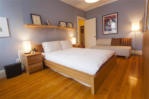 8 Chiswick Road, Unit 27 Boston, MA 02135 - Photo 3 of 9 a bed room with a bed and furniture