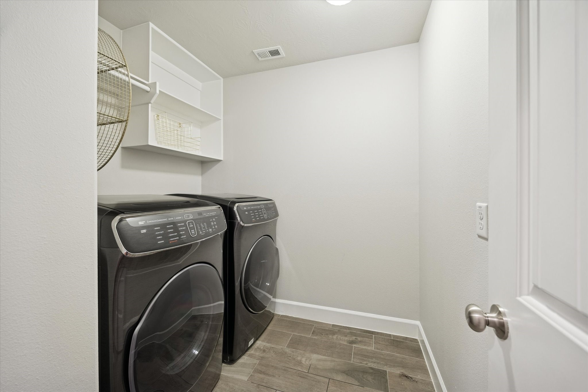 4014 Woodhead Street Houston, TX 77098 - Photo 34 of 37 a utility room with dryer and washer