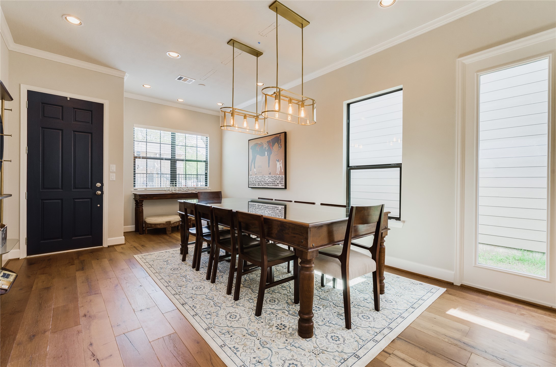4014 Woodhead Street Houston, TX 77098 - Photo 8 of 37 a view of a a dining room with furniture window and wooden floor