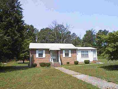 3616 Platinum Road Richmond, VA 23234 - Photo 1 of 1 a view of a yard in front of a house with a large tree