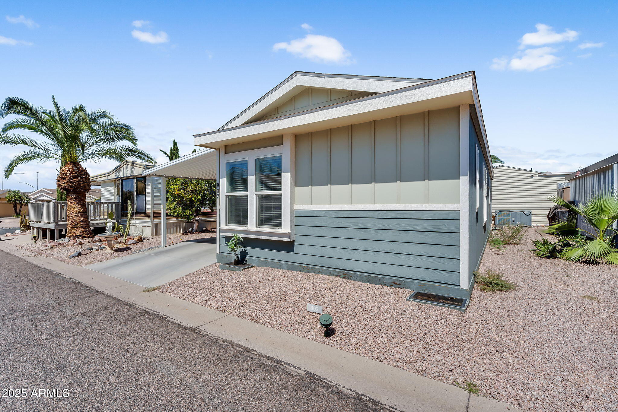 8865 East Baseline Road, Unit 802 Mesa, AZ 85209 - Photo 20 of 44 a view of a house with outdoor space and porch