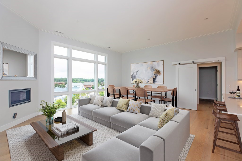 10 Shipyard Drive, Unit 517 Hingham, MA 02043 - Photo 1 of 14 a living room with furniture and a large window